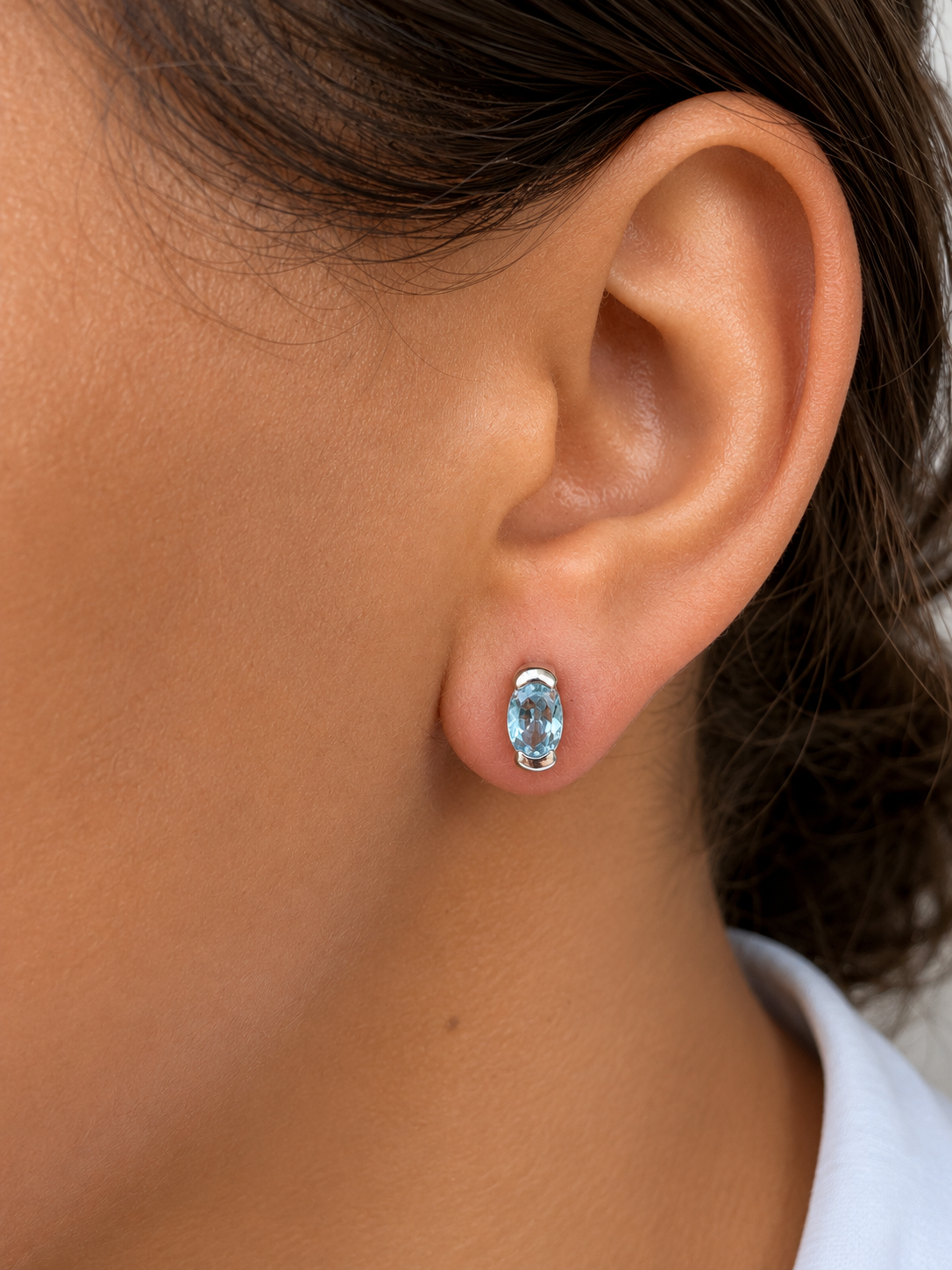 925 sterling silver earrings with oval blue topaz