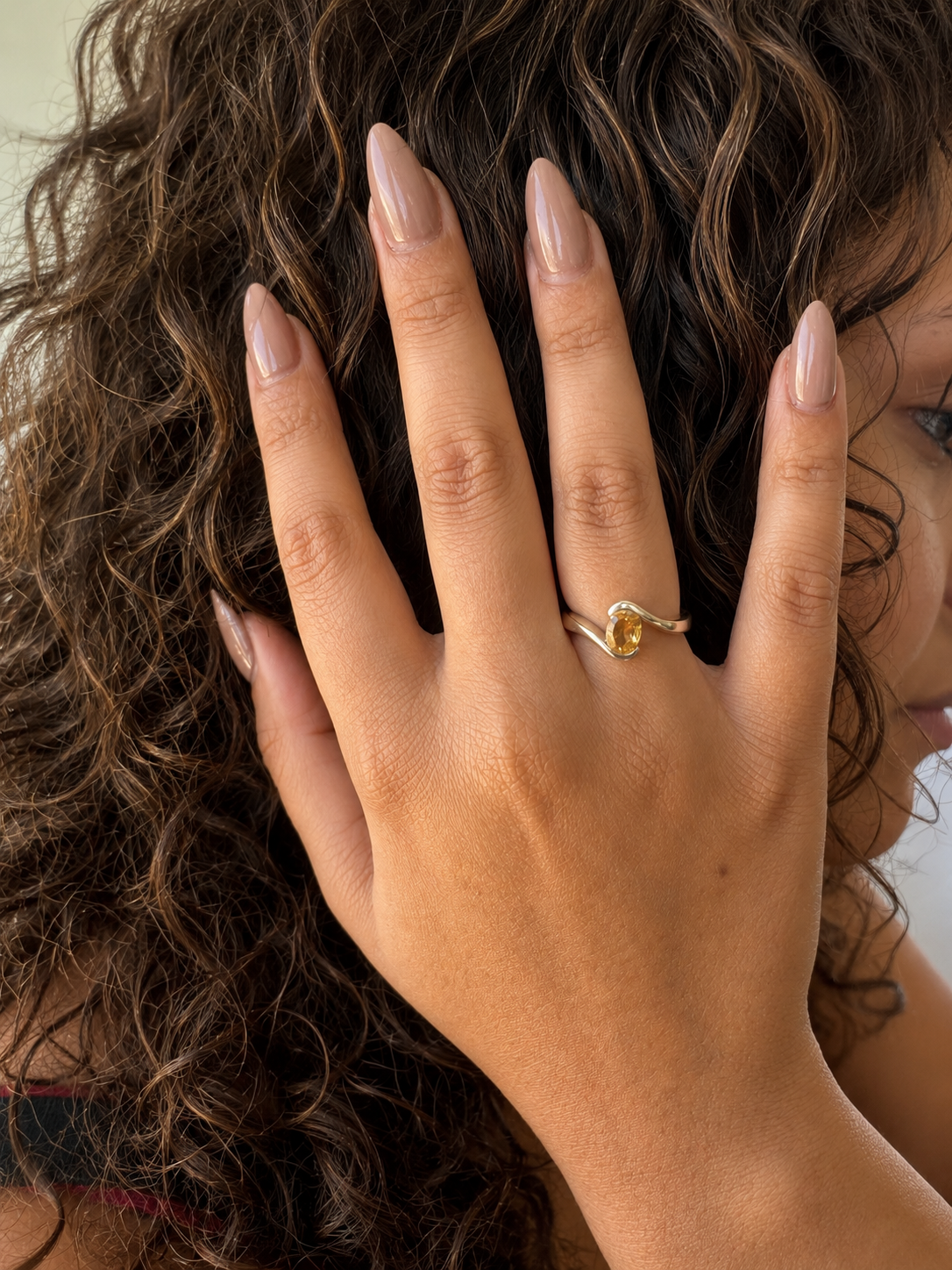 925 sterling silver ring in a wave design with a solitaire and an oval citrine.