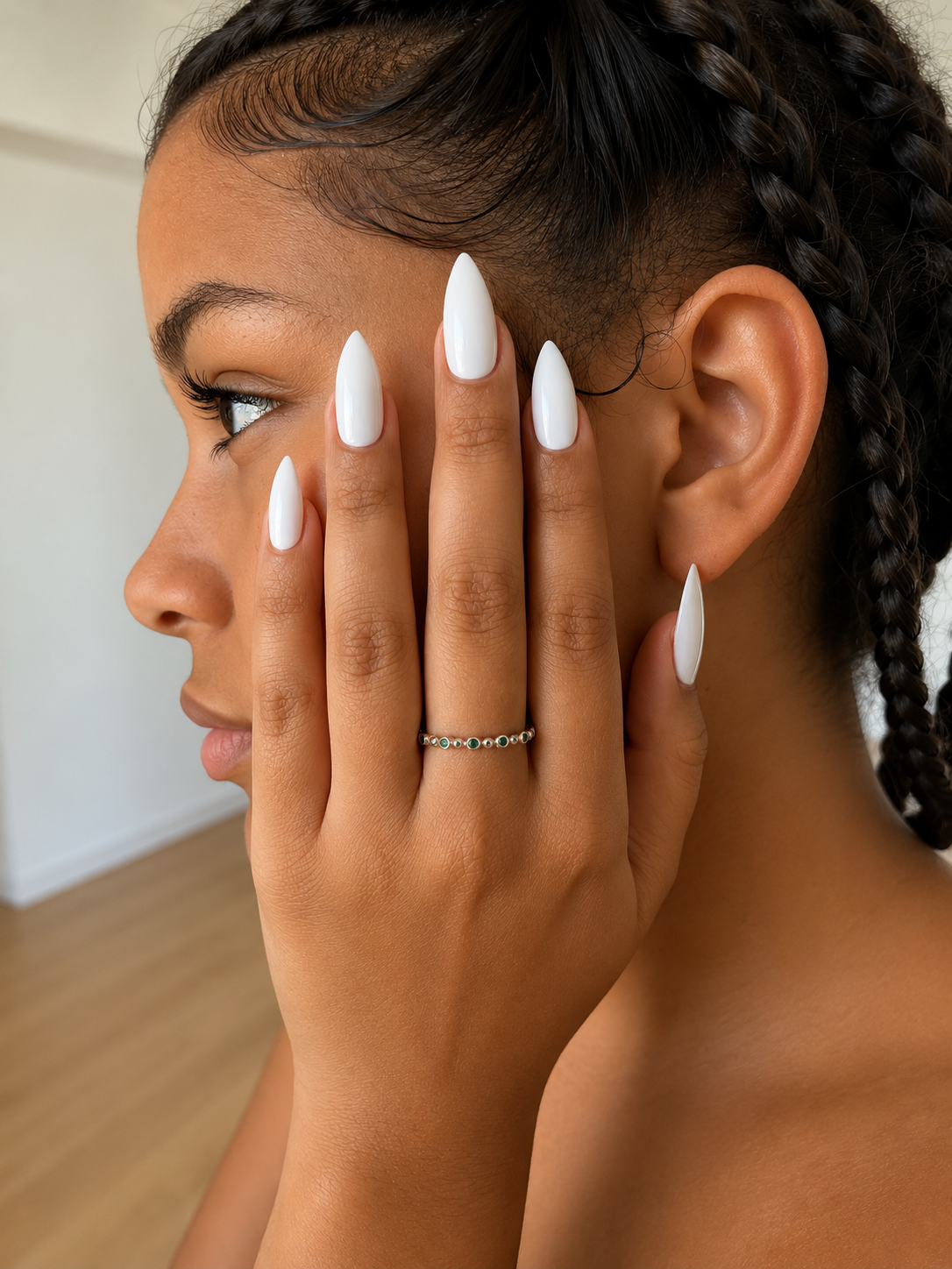 Delicate 925 sterling silver ring with small emeralds