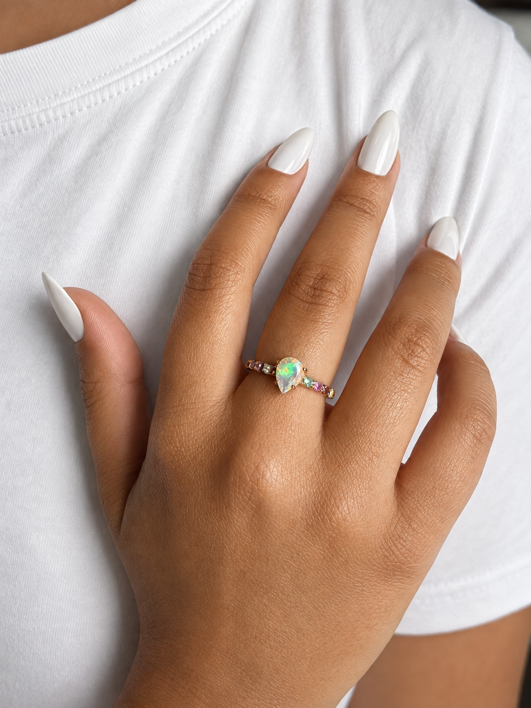 Princess Teardrop ring in 925 sterling silver rose gold with multiple sapphires.