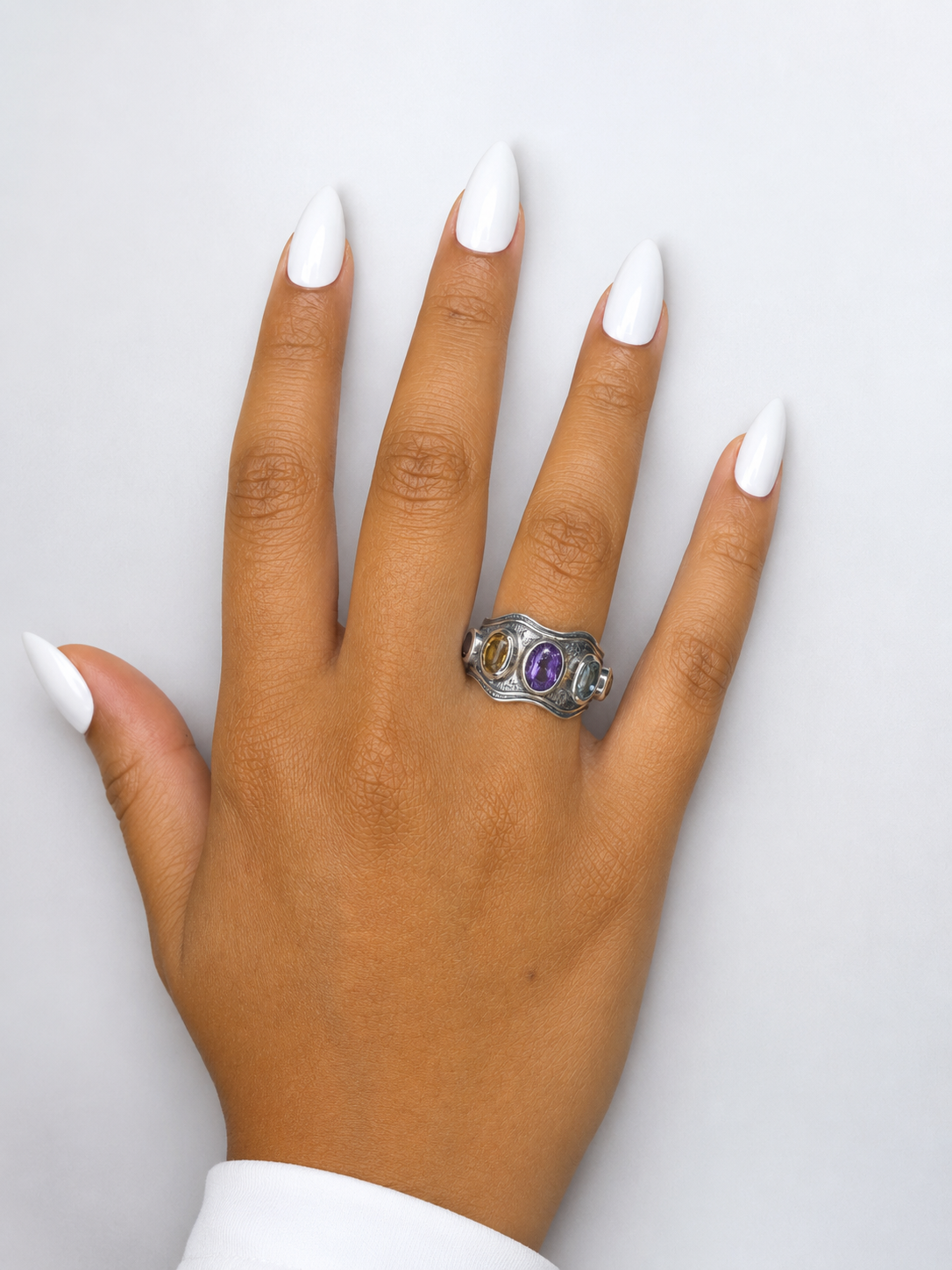 Silver ring with amethyst , blue topaz, citrine, garnet and peridot.