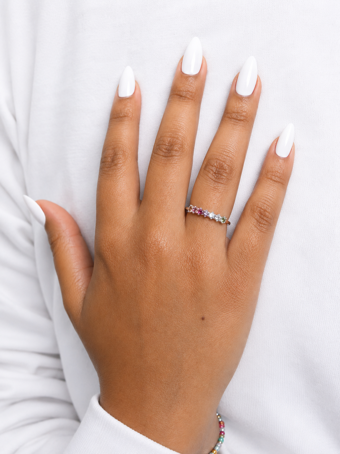 Minimalist ring with 8 round 925 silver sapphires.