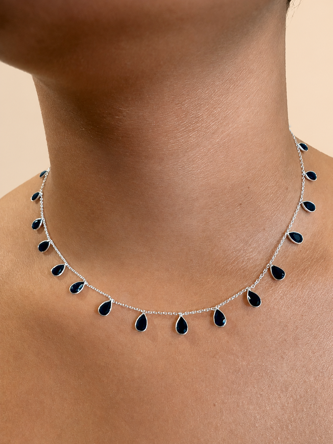 Necklace in 925 sterling silver with teardrop sapphires.