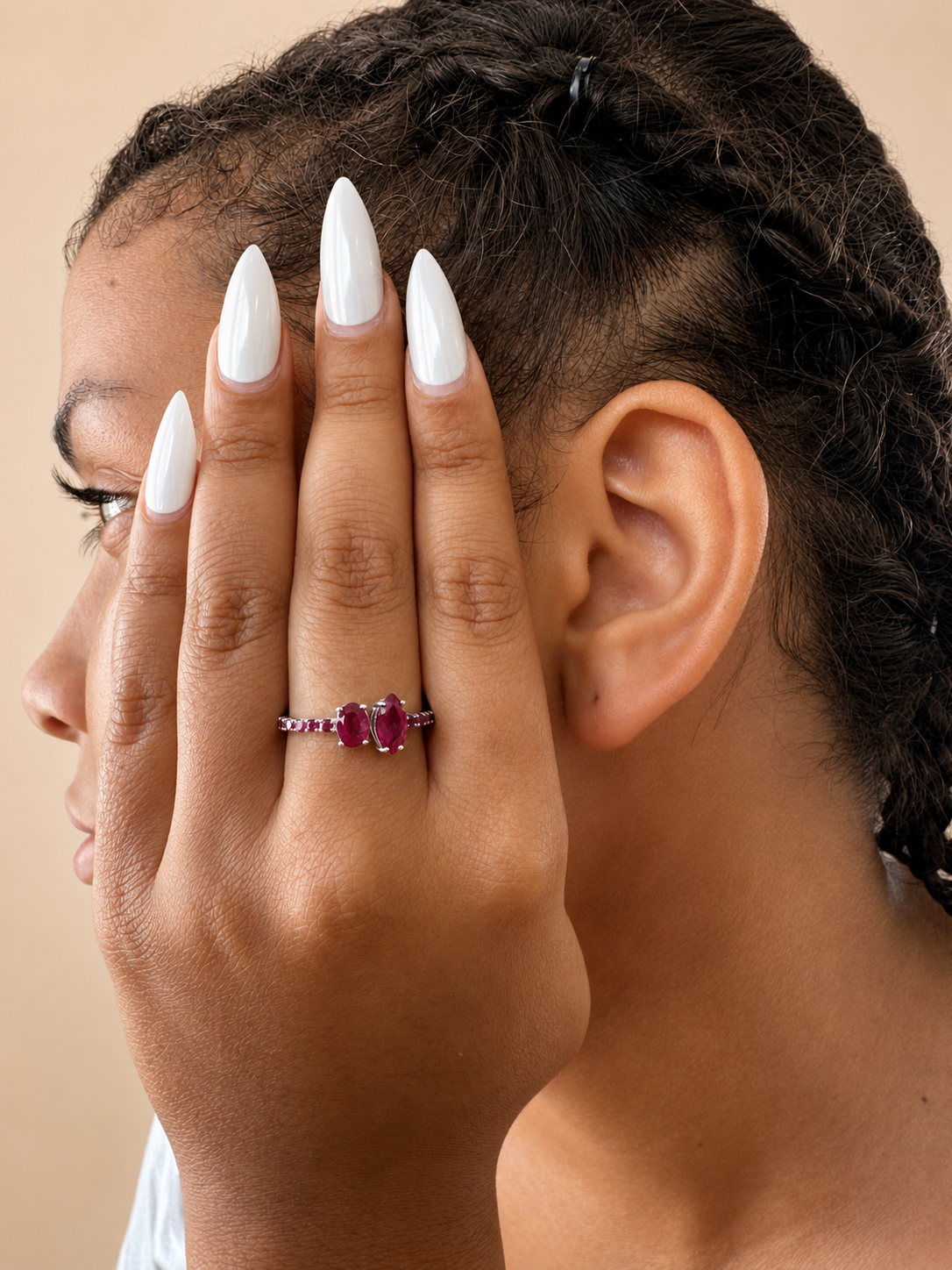 925 sterling silver ring set with rubies, featuring two prominent rubies: a teardrop and a marquise.