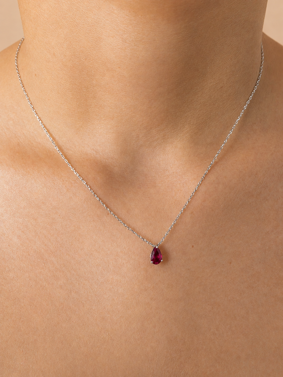 925 sterling silver necklace with a teardrop-shaped ruby.