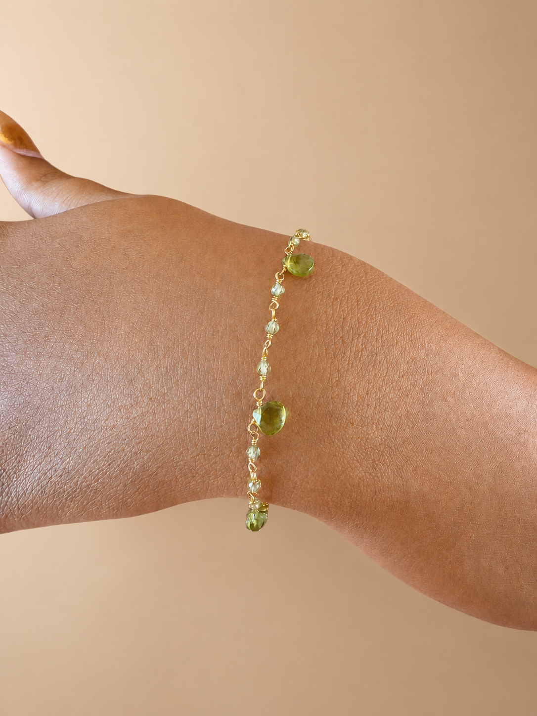 925 sterling silver gold plated bracelet with peridots.