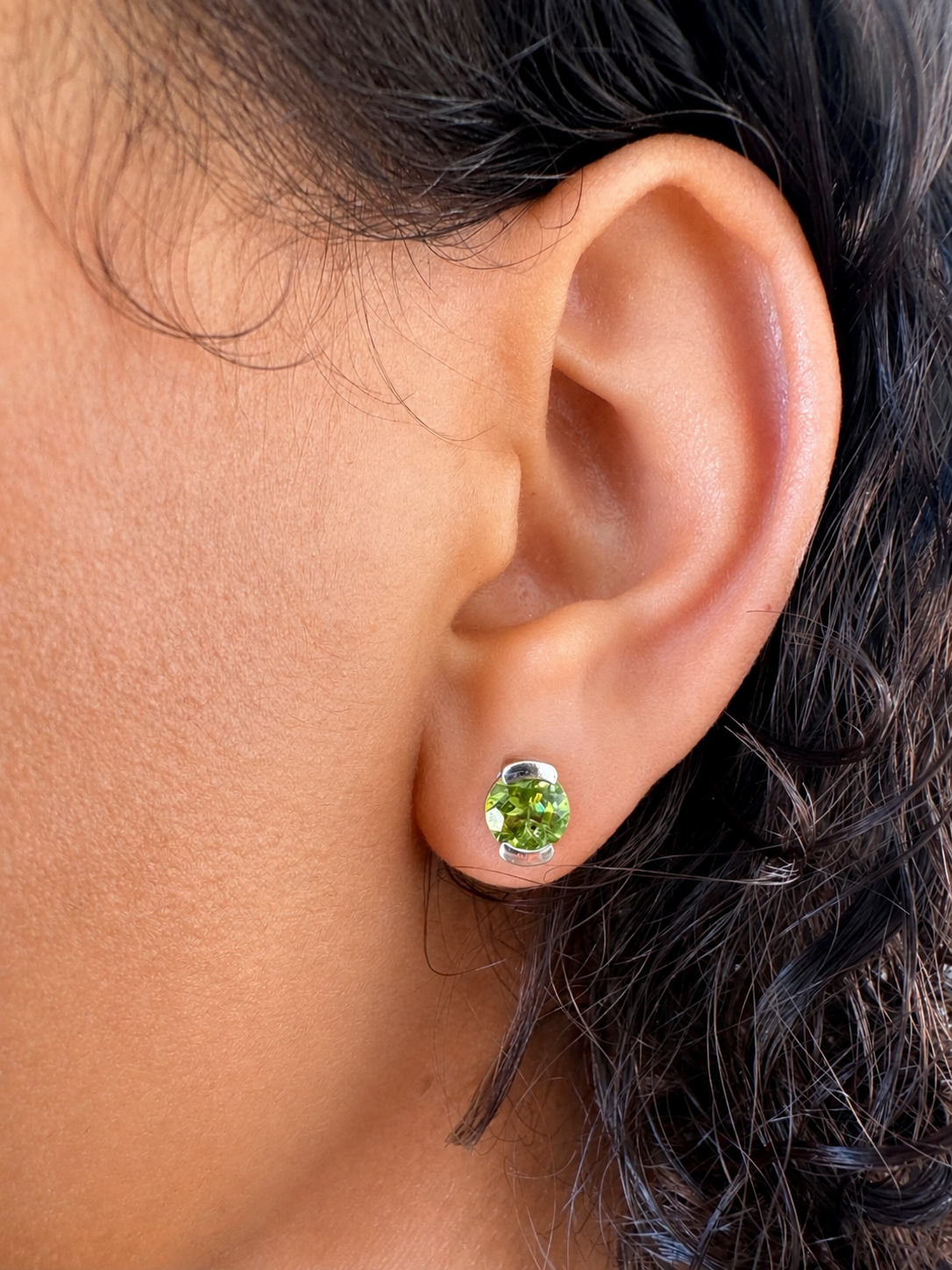 925 sterling silver earrings with a round peridot.