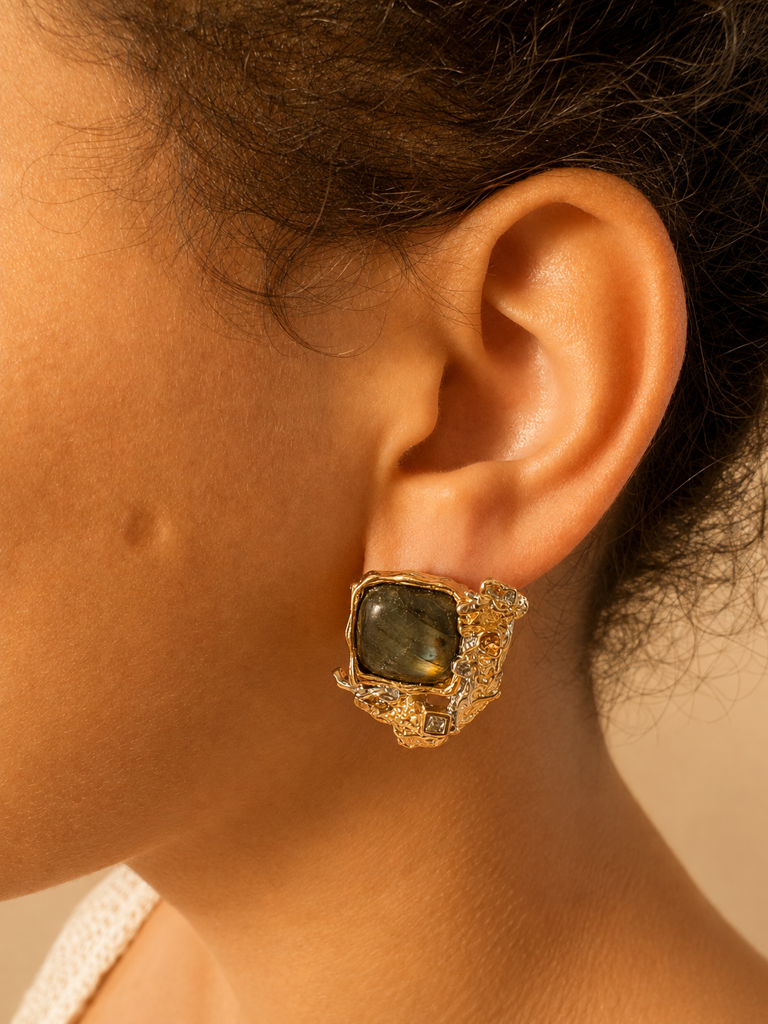 Handmade 925 sterling silver earrings with cabochon labradorites and gold details.