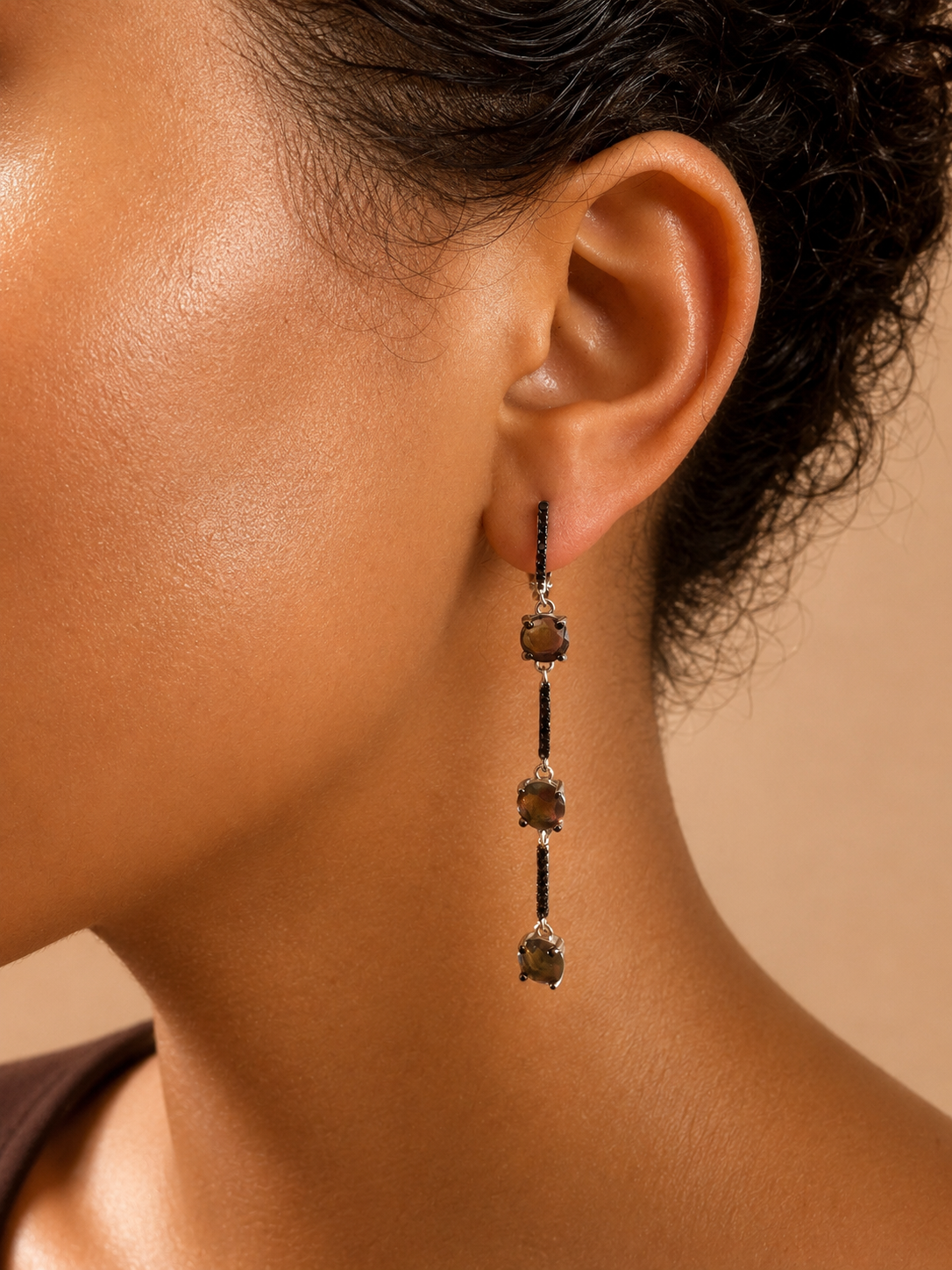 925 sterling silver earrings with black sapphires and black opal.