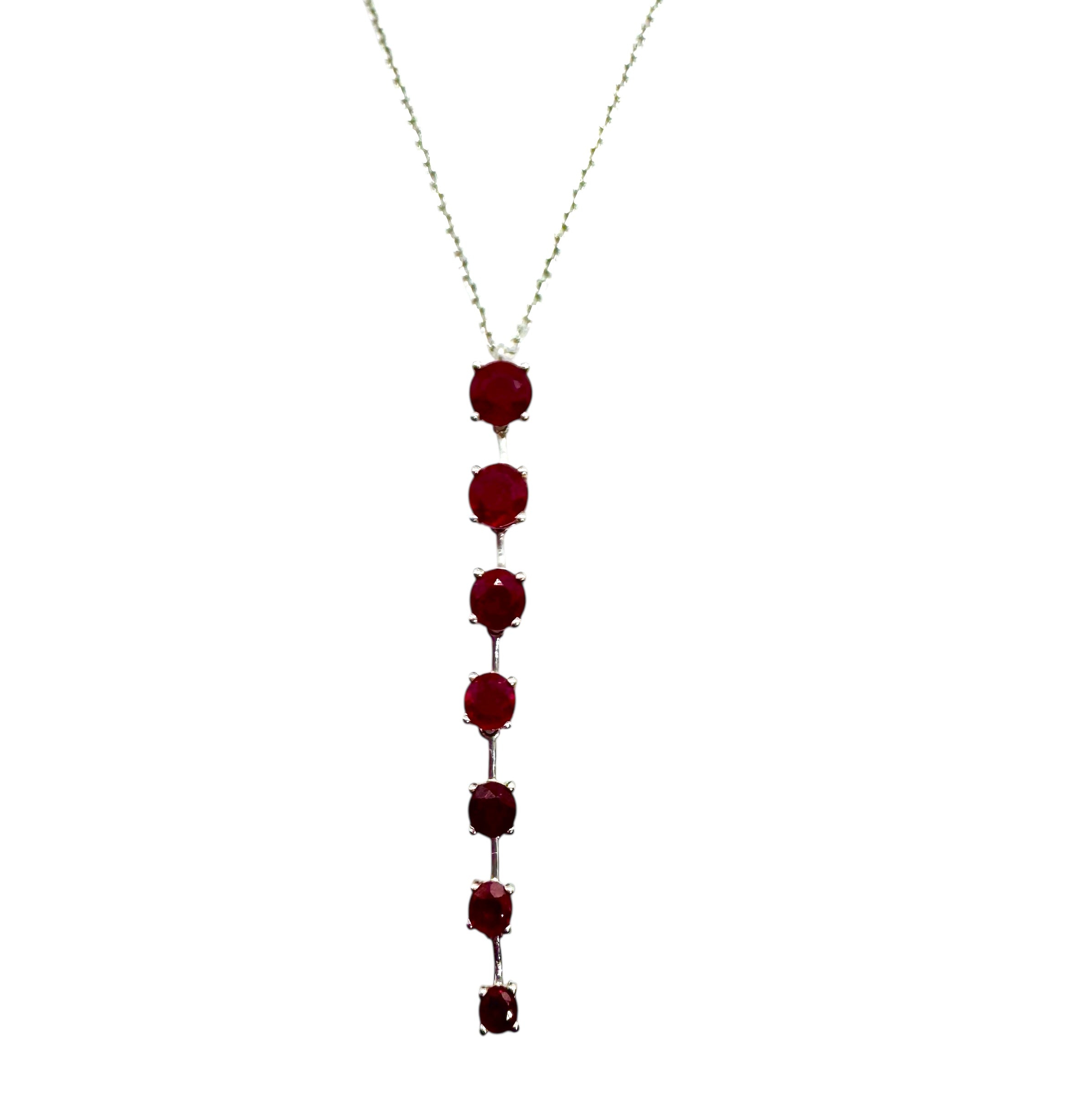Colar de sete rubis facetados