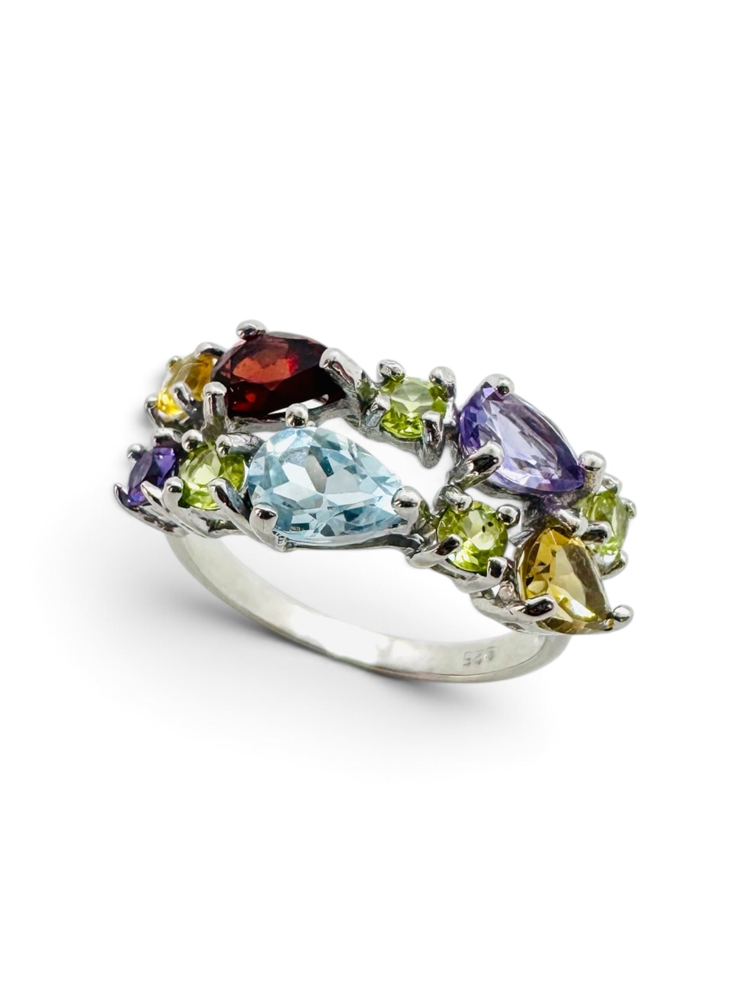 925 sterling silver cocktail ring with 10 irregular gemstones: Amethyst, citrine, peridot, garnet, and blue topaz.