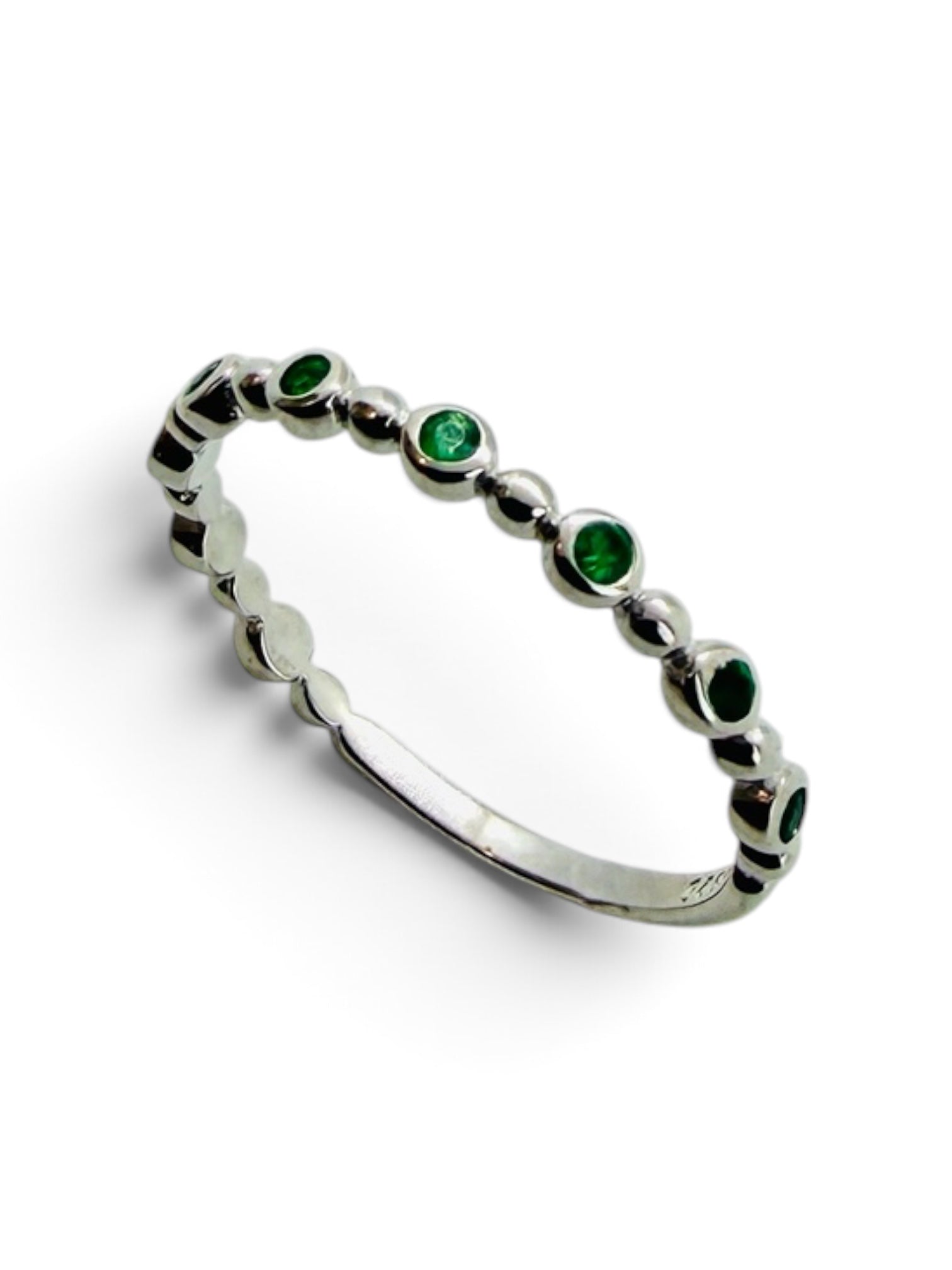Delicate 925 sterling silver ring with small emeralds
