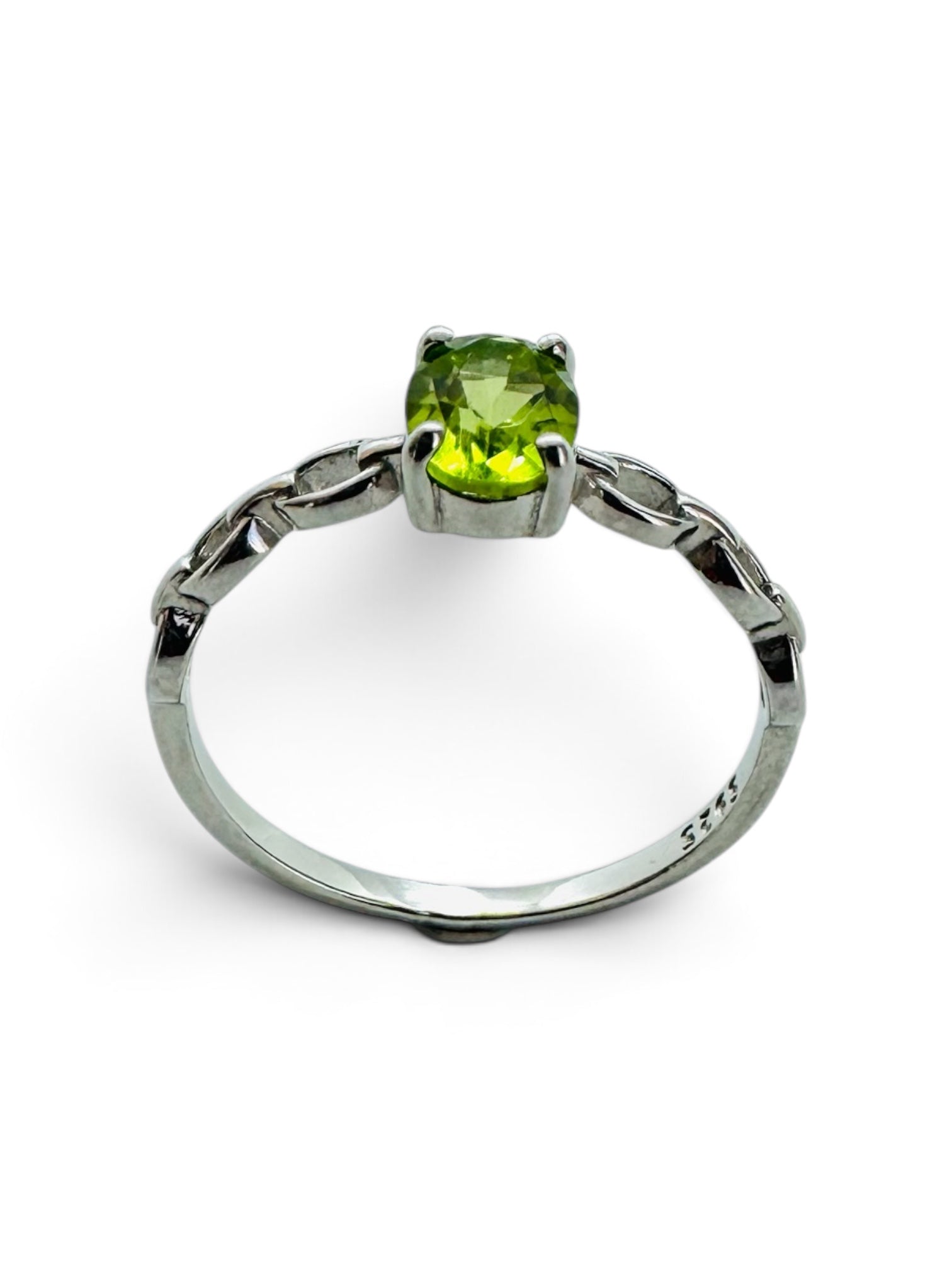 925 sterling silver solitaire ring in braided design with oval peridot.