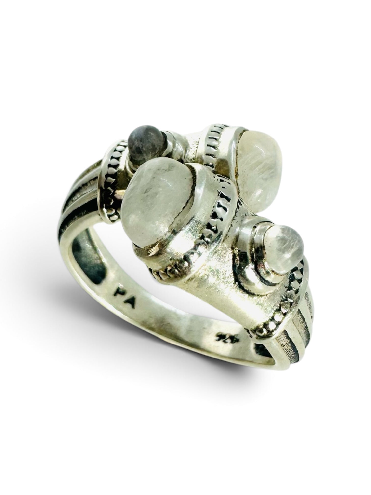 Irreverent and adaptable 925 sterling silver ring with moonstone cabochons.