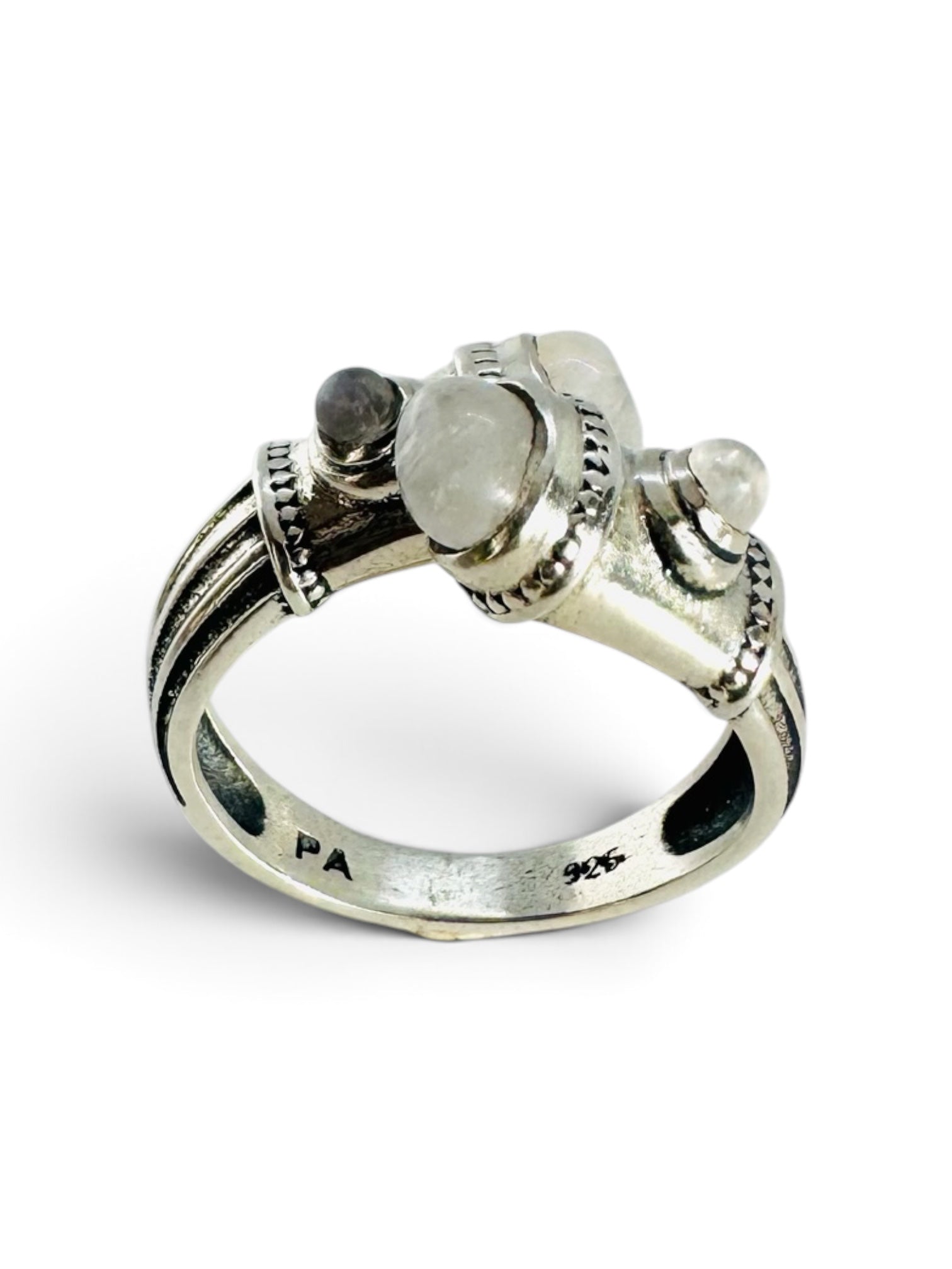 Irreverent and adaptable 925 sterling silver ring with moonstone cabochons.