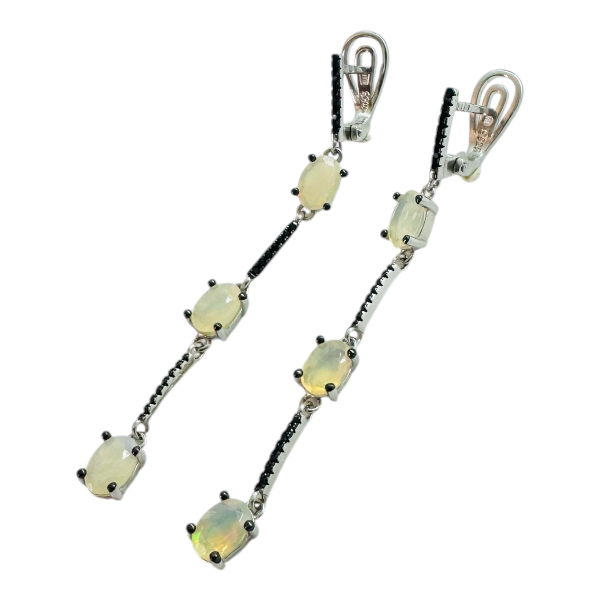925 sterling silver earrings with black sapphires and opal.