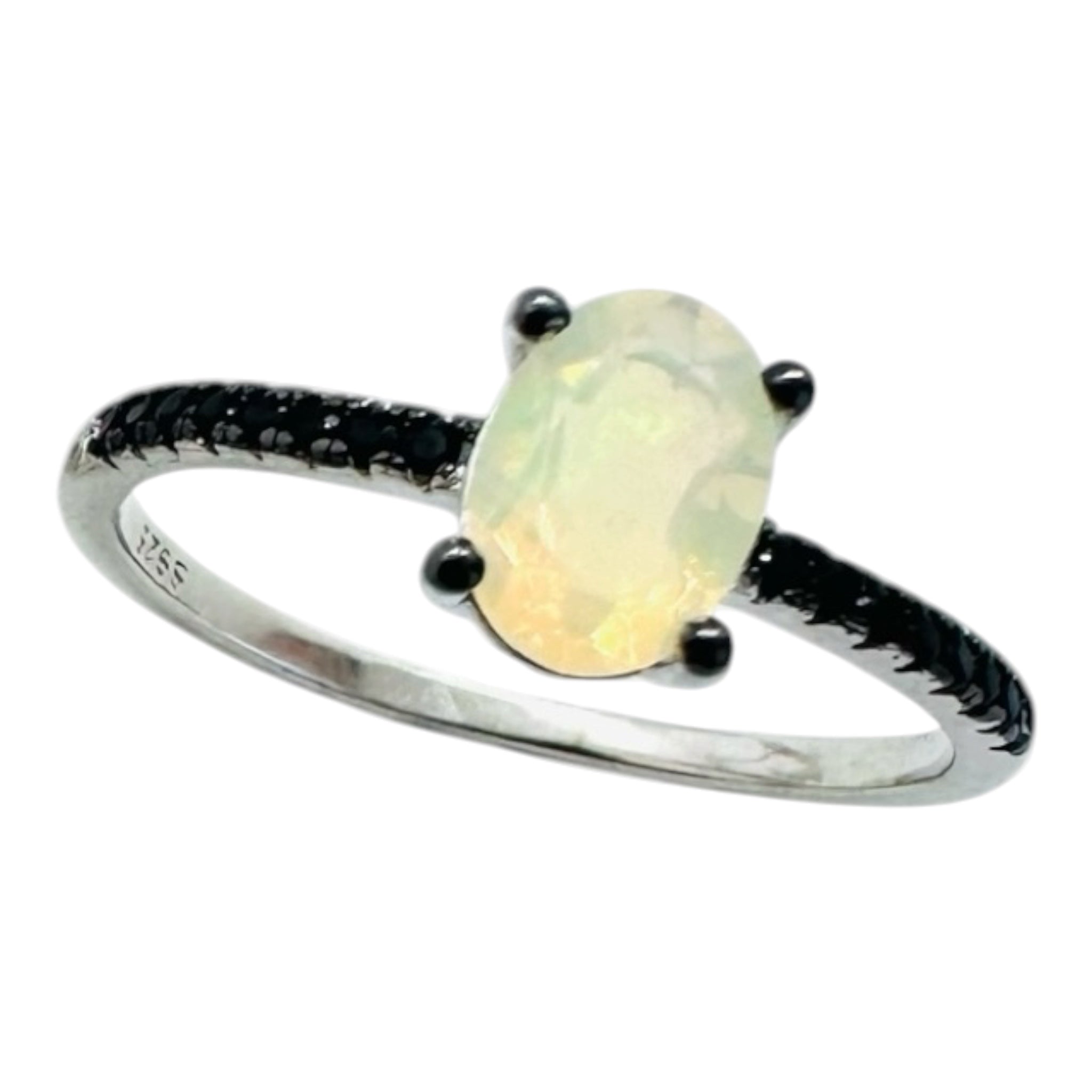 925 sterling silver ring with black sapphires and opal.